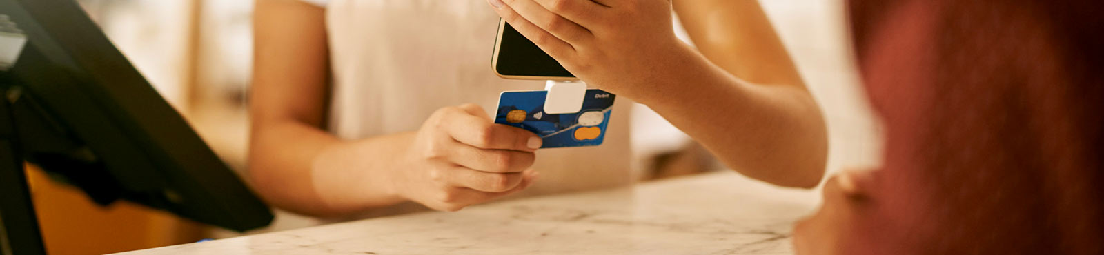 Worker swiping card with mobile card reader