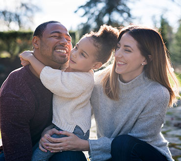 Parents with young daughter.