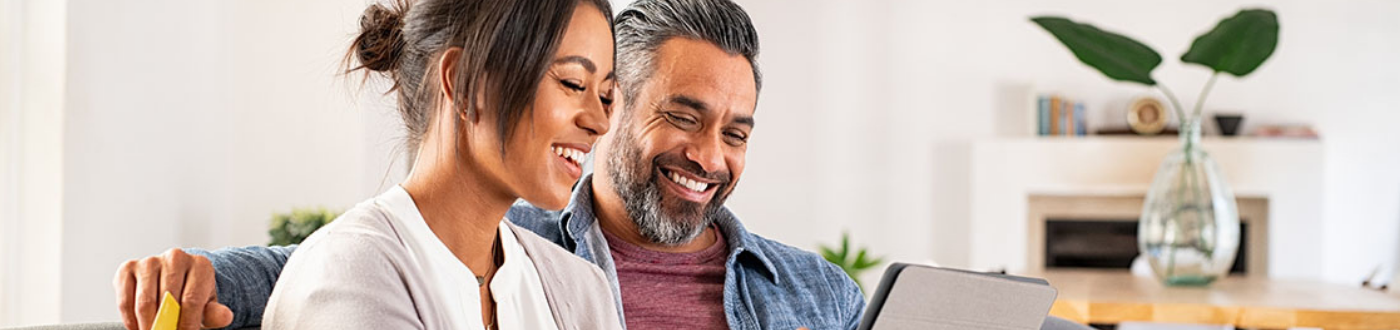 couple reviewing content on laptop